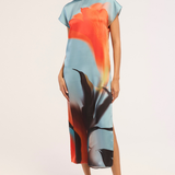 Model wearing a colorful printed sleeveless midi dress.