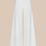 White wide-leg pants with a front slit on a beige background