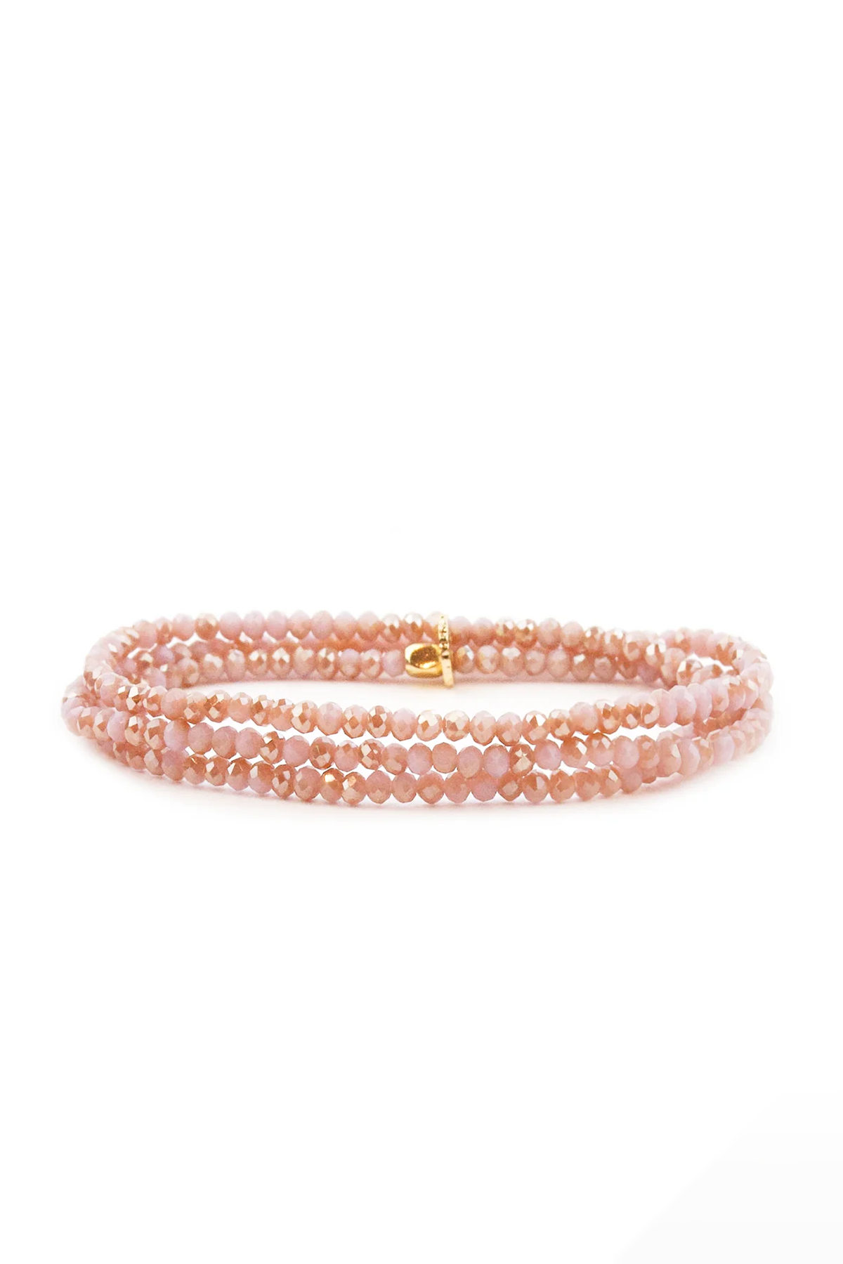 Pink beaded bracelet with a gold clasp on a white background