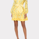 Yellow floral dress with a bow detail on a white background