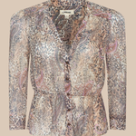 Patterned blouse on a beige background