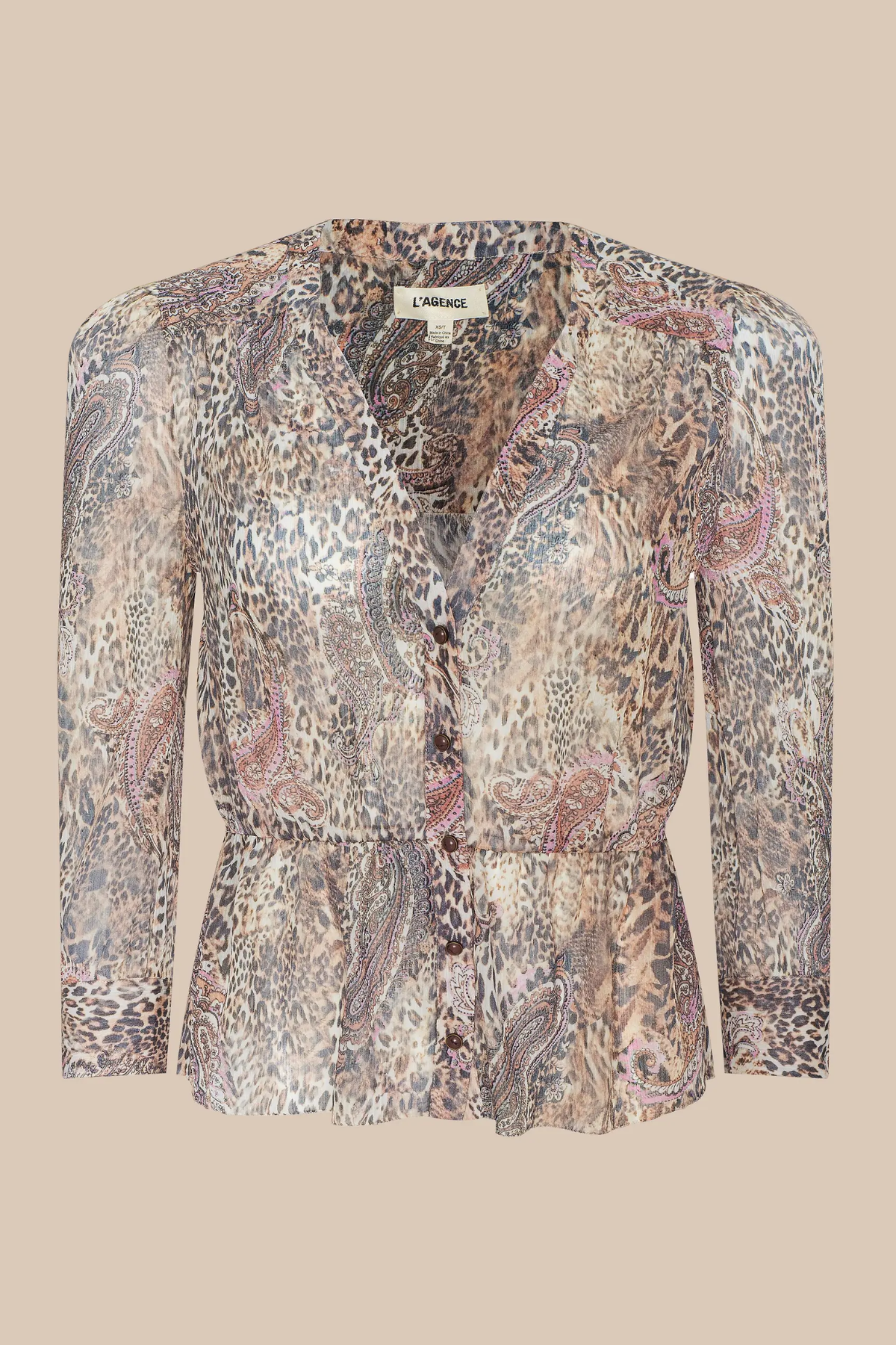 Patterned blouse on a beige background
