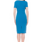 back of woman blue midi dress on white background 