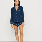 Navy blue Tencel™ modal pajama set featuring a short-sleeve button-front top and matching shorts.