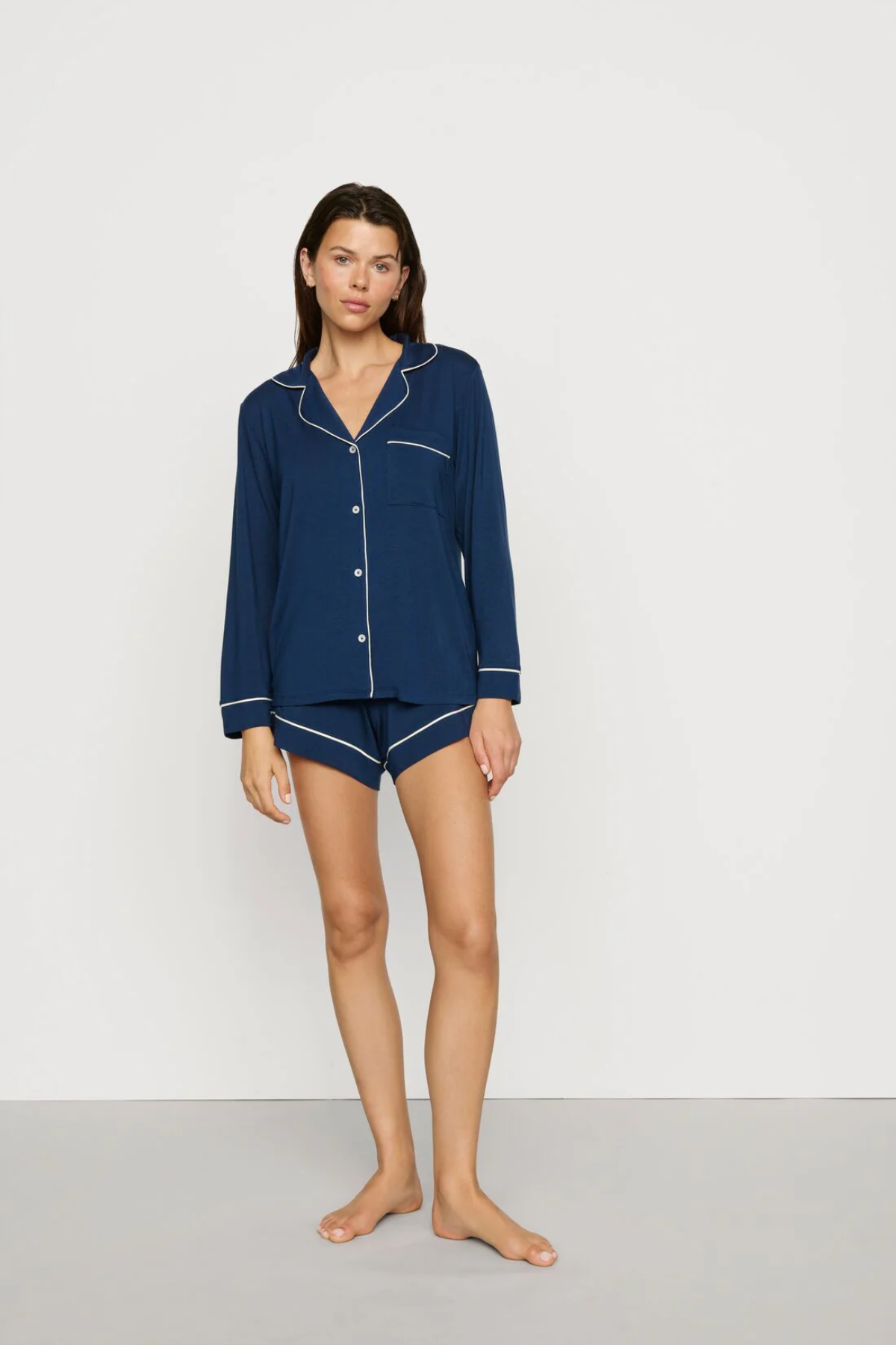 Navy blue Tencel™ modal pajama set featuring a short-sleeve button-front top and matching shorts.