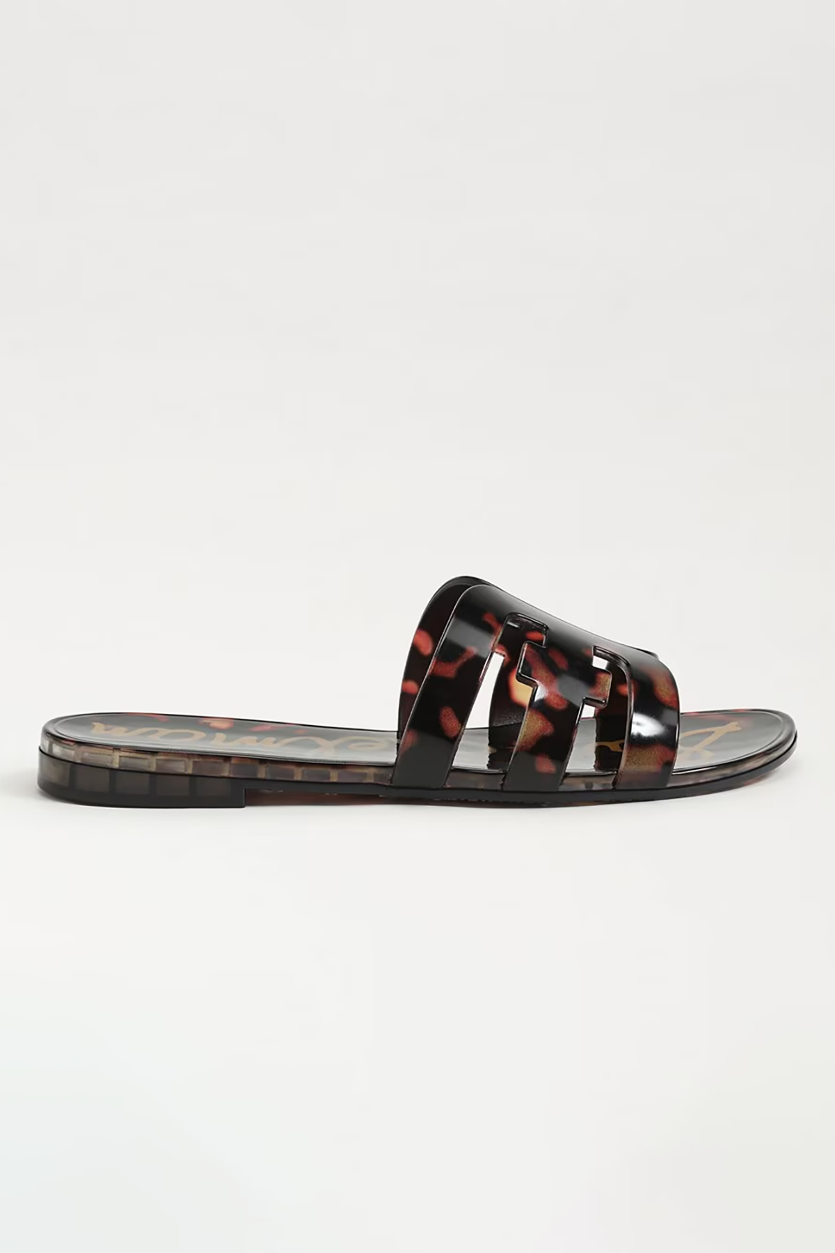 Tortoiseshell slide sandal on a white background