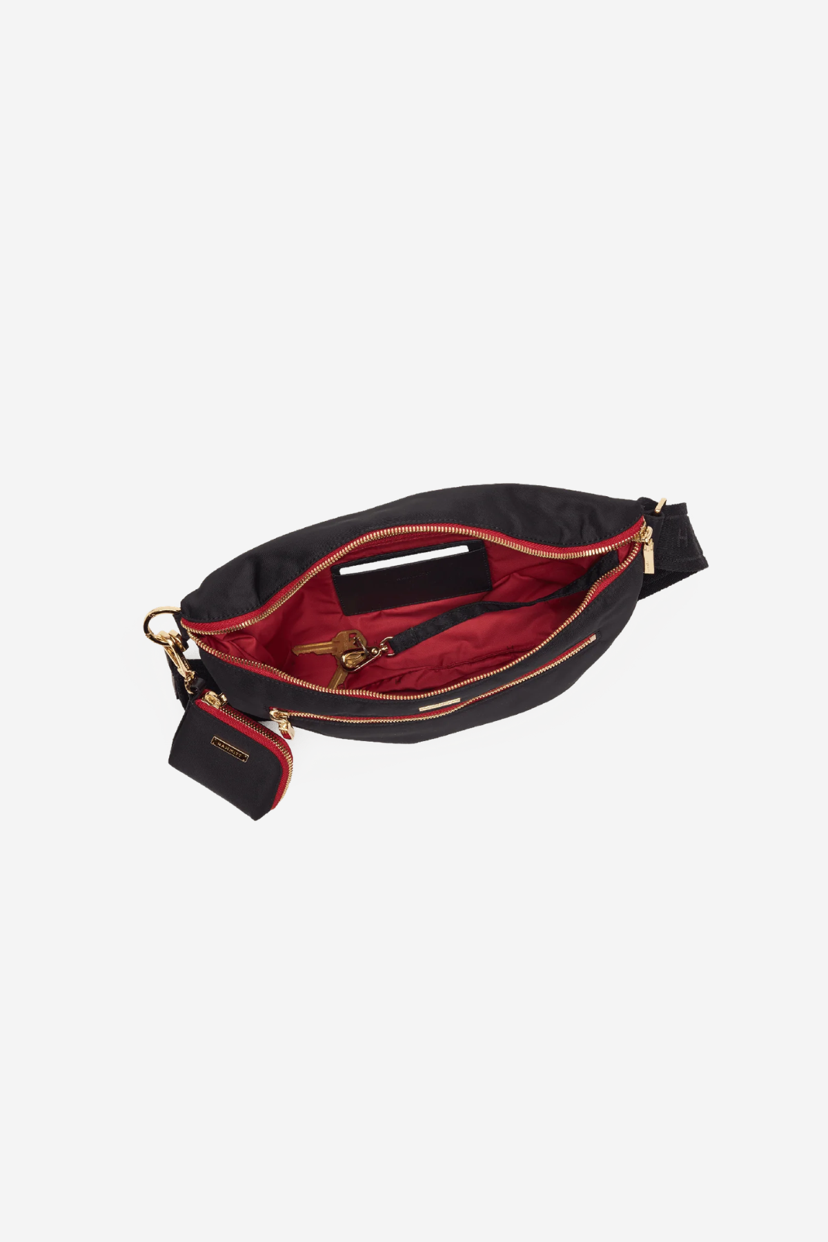 Large structured crossbody bag in a neutral tone featuring an adjustable strap and polished hardware.