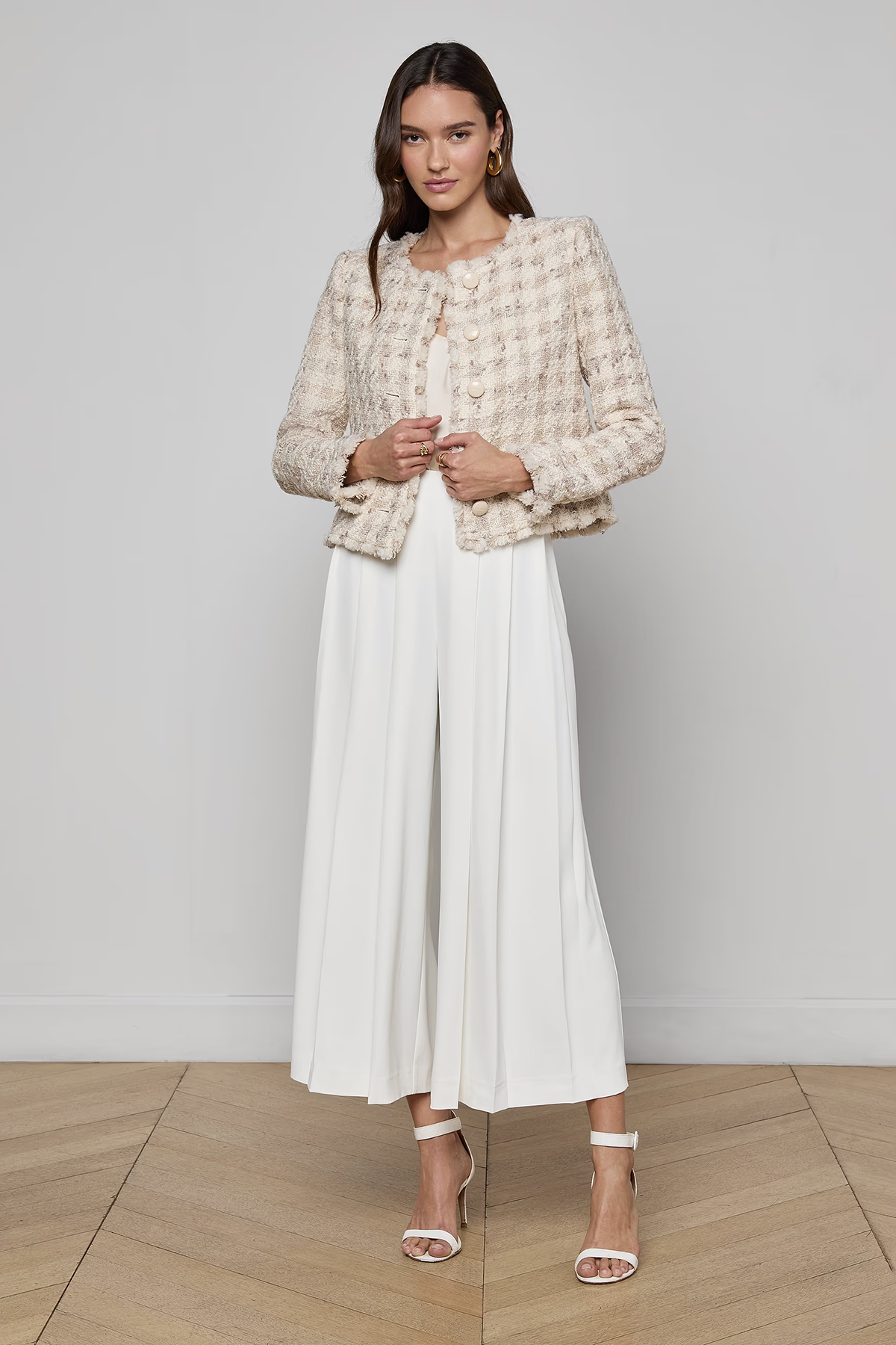 Collarless tailored jacket in a neutral tone, styled over a lightweight top