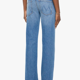 Model wearing light-wash denim jeans with twisted seam detailing and a relaxed straight-leg fit.