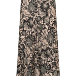 A high-waisted, floor-length A-line skirt featuring an intricate floral and botanical damask pattern in black, beige, and gray tones, shown against a plain white background.