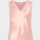 Pink sleeveless top on a light gray background