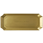 A rectangular gold-toned metal tray with beveled corners and a subtle embossed script in the center, shown against a plain white background.