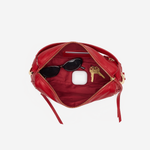 Medium-sized structured leather handbag in a rich red hue featuring a top handle and detachable shoulder strap.