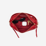 Medium-sized structured leather handbag in a rich red hue featuring a top handle and detachable shoulder strap.