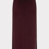 A dark burgundy midi skirt with a front slit and side pockets, shown against a light gray background.