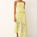 woman in yellow lace set on white background 