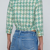 Cropped jacket with three-quarter sleeves in a soft patterned fabric.