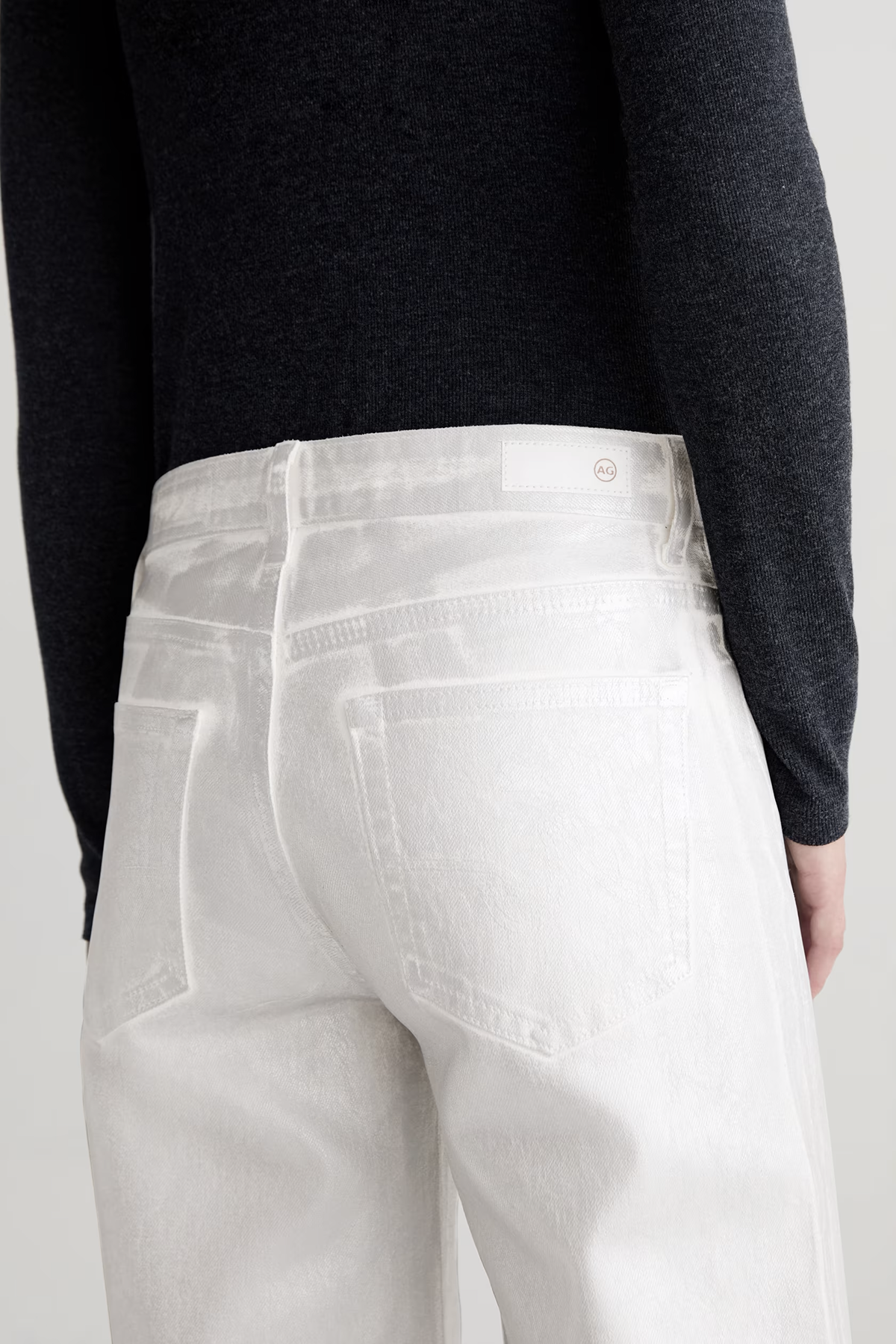 High-rise cropped wide-leg pants in a light neutral tone