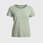 Green baby tee in front of plain white background