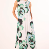 woman in floral printed dress on white background 