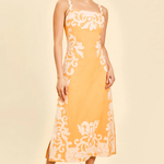 woman in orange embroidered midi dress 