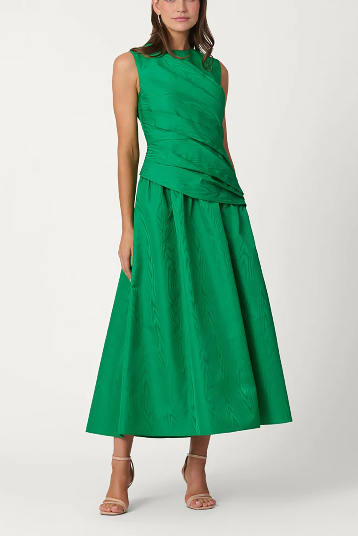 Green dress worn by a model on a white background