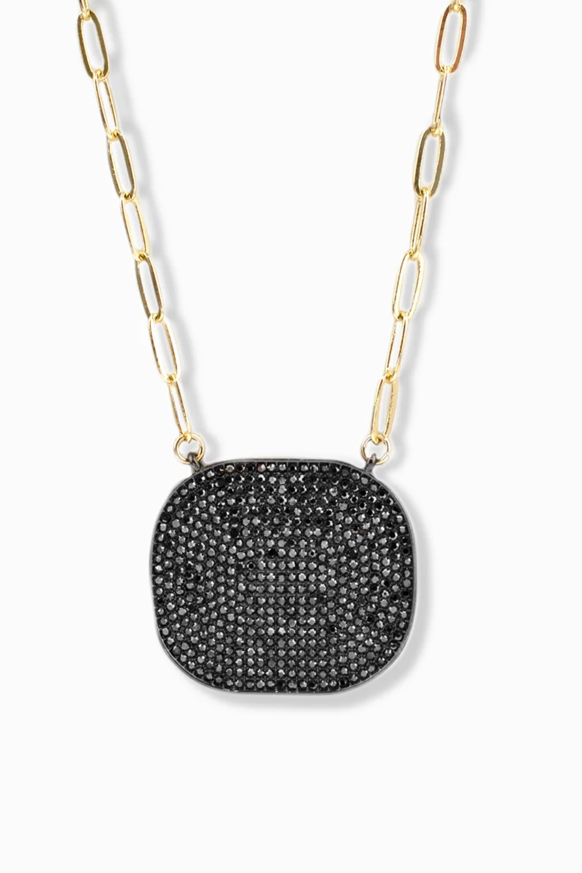 Necklace with black pendant and gold chain on a white background