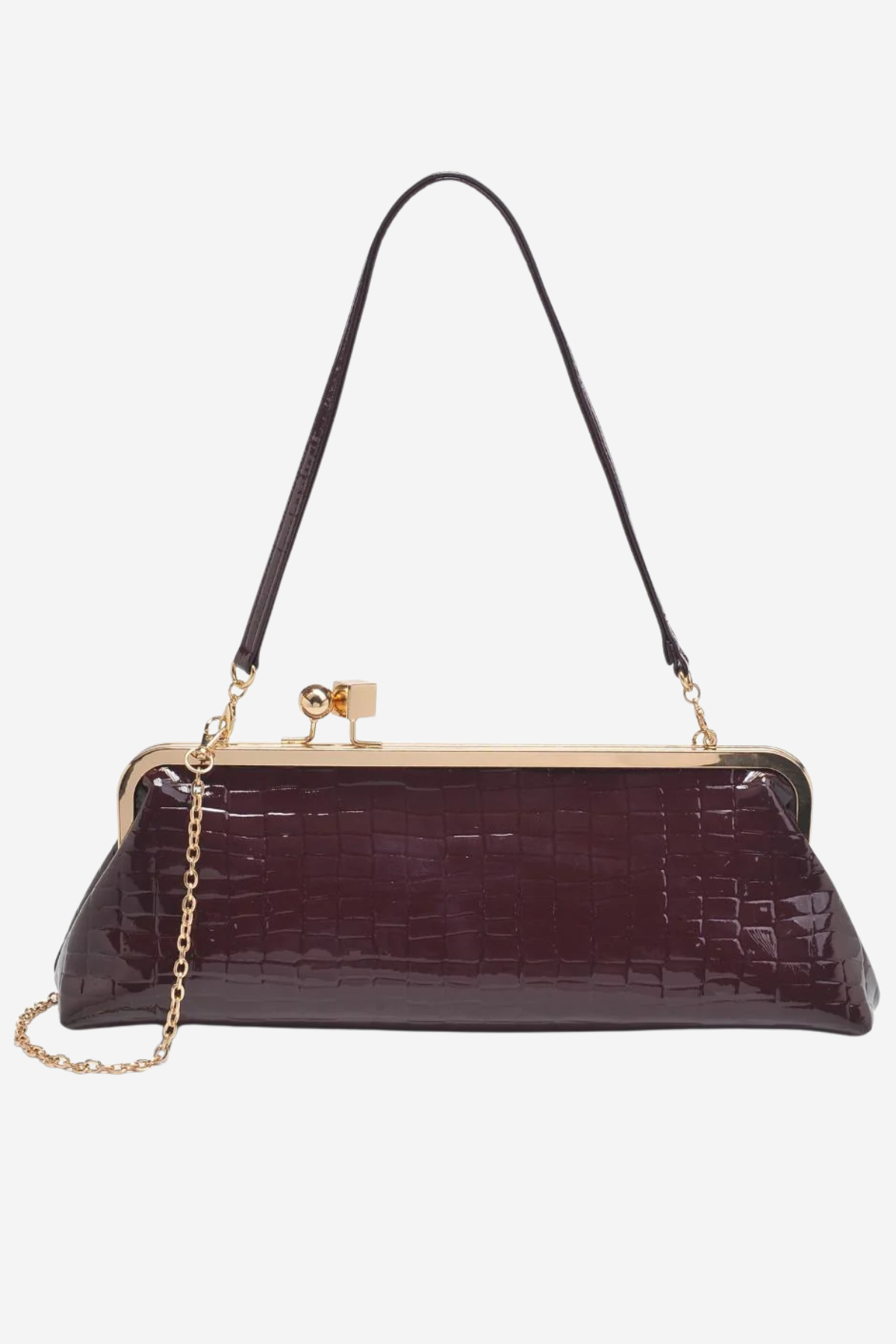 A dark plum purple crocodile-embossed clutch handbag with a gold-tone kiss-lock closure, a thin black shoulder strap, and a gold chain link accent, shown against a plain white background.
