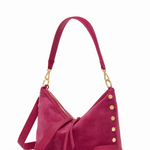 Pink handbag with gold accents on a white background