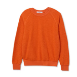 Orange sweater on a white background