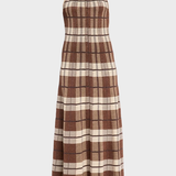 A sleeveless halter-neck maxi dress with a brown, beige, and black plaid pattern, displayed on a neutral light gray background.