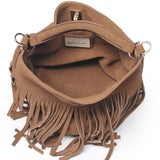 Brown suede handbag with fringe details on a white background