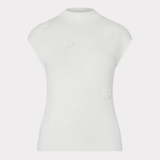 A white mock-neck knit top with cap sleeves, featuring small raised fabric flower embellishments on the front, displayed on a ghost mannequin against a light gray background.