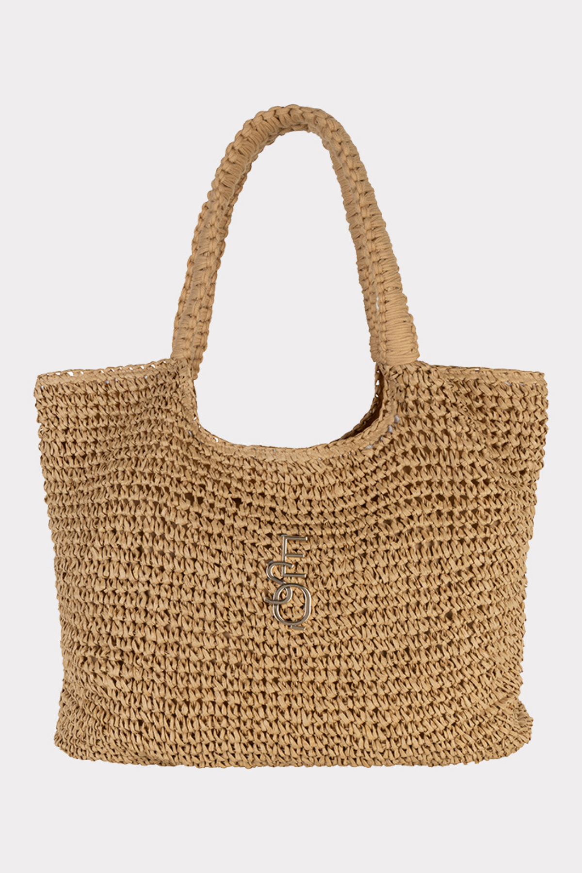 Beige woven handbag on a light beige background