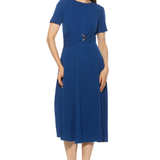 Woman wearing a blue dress on a white background