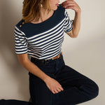 Striped short-sleeve tee with a relaxed fit, styled with denim