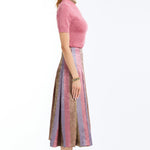 Pleated midi skirt with a soft, flowing silhouette and multicolor tones