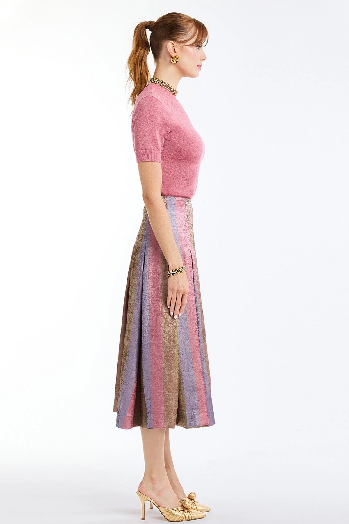 Pleated midi skirt with a soft, flowing silhouette and multicolor tones