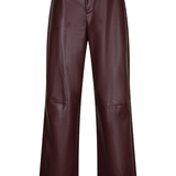 A pair of high-waisted, wide-leg trousers in a deep burgundy faux leather, shown against a plain white background.