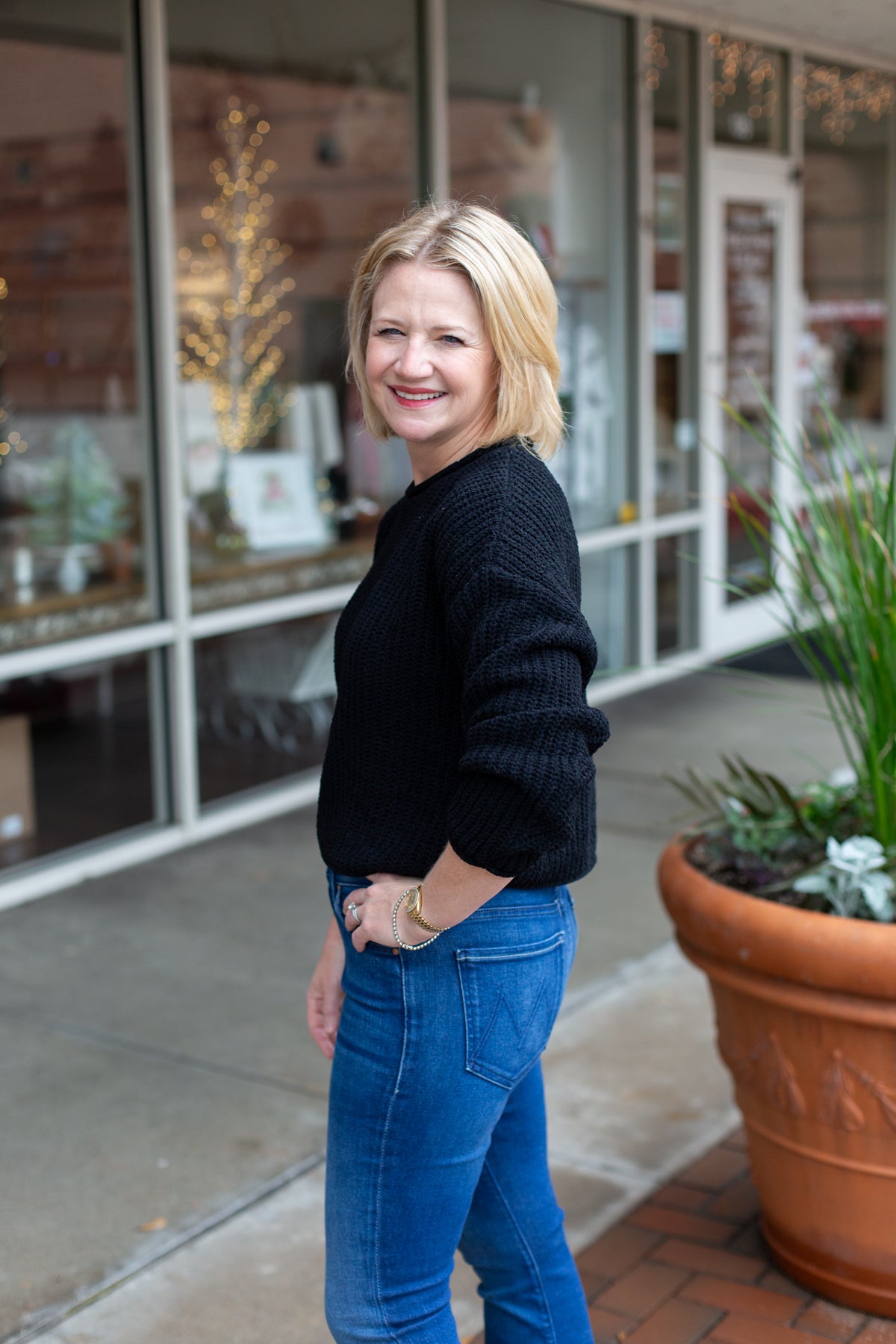 Minimal knit sweater with rolled edge detailing