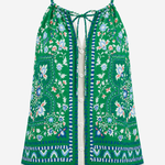 A green sleeveless camisole top with a colorful floral and paisley print, featuring thin shoulder straps, a front tie closure, and a button-up front, shown against a plain light gray background.