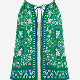 A green sleeveless camisole top with a colorful floral and paisley print, featuring thin shoulder straps, a front tie closure, and a button-up front, shown against a plain light gray background.