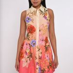 Woman wearing a floral dress with a white background