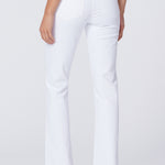 White pants worn by a person on a white background