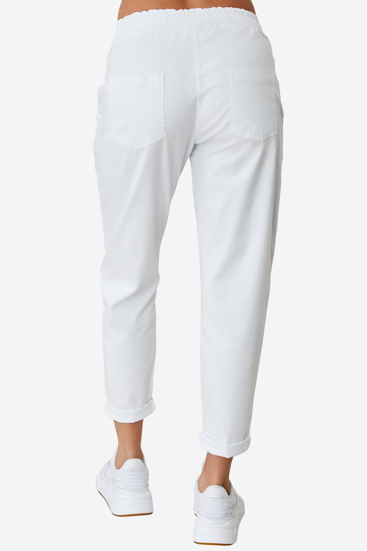 Women's lightweight white jogger pants featuring a drawstring waistband, side pockets, and tapered leg.