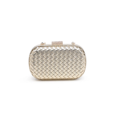 gold woven clutch bag on a white background