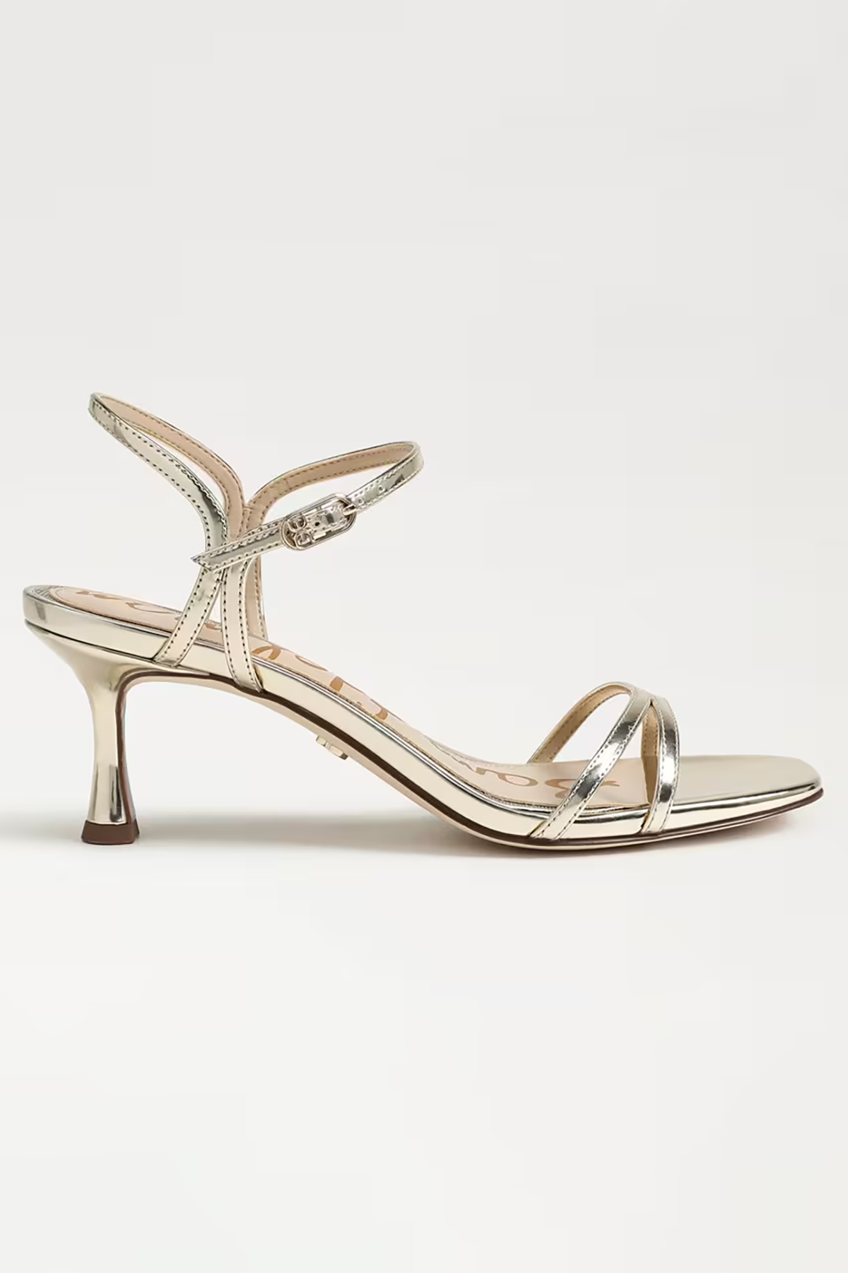 Gold high-heeled sandal with thin straps on a white background