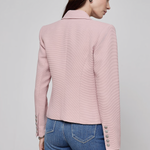 Tailored blazer with clean lines in a soft pink tone