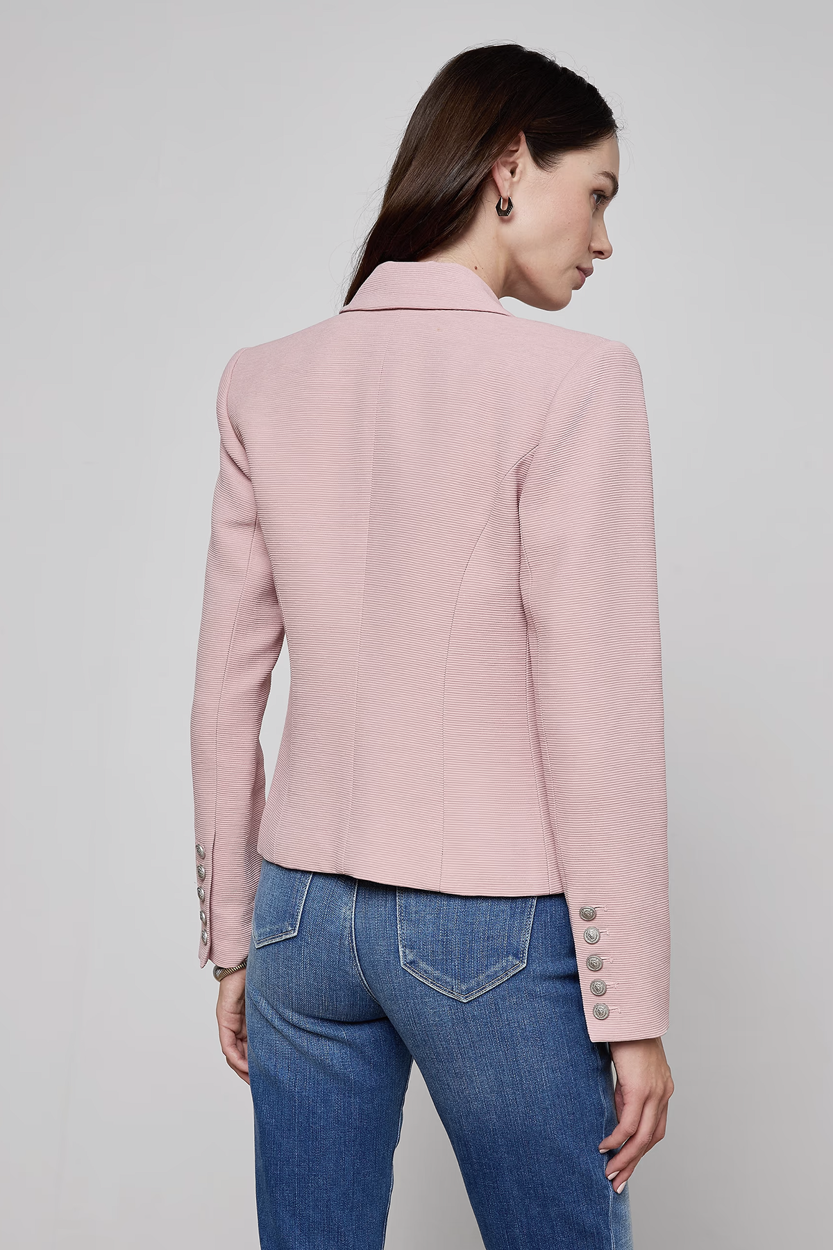 Tailored blazer with clean lines in a soft pink tone