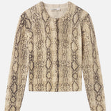 Cashmere cardigan with subtle snake pattern, styled with dark denim